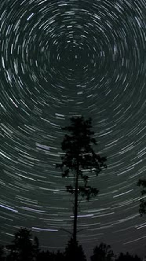 Abstract Time Lapse of Star Trails in Night Sky