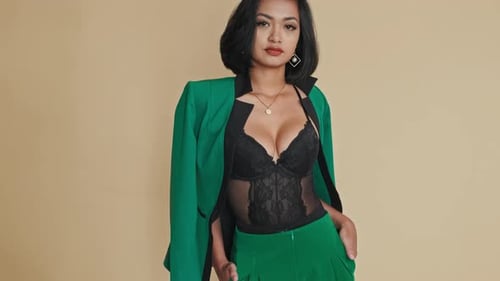 Asian Model in Seductive Outfit Posing in Studio