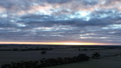 Sunset Over Expansive Rural Landscape Aerial View