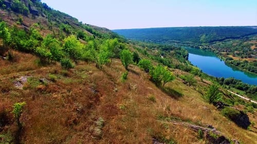 Eye-catching view of the amazing mountainous landscape and river floating at the foot.