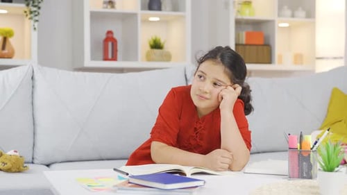 Girl child focused on thinking.