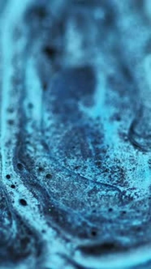 Macro Shot of Abstract Blue Liquid Surface