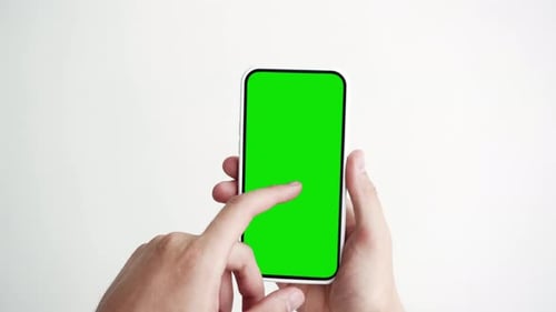 Young Person Touch Smartphone with Green Screen Chroma Key Closeup POV