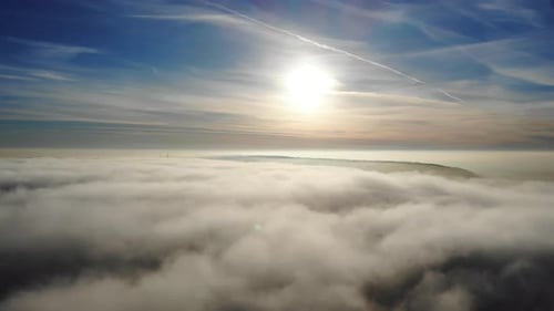 Aerial View of Clouds and Landscape at Sunrise