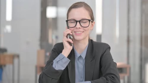 Young Businesswoman Talking on Cell Phone