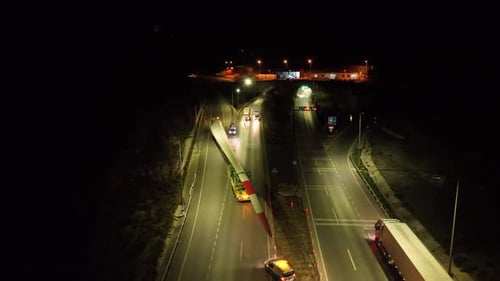 Wind Turbine Being Moved At Night