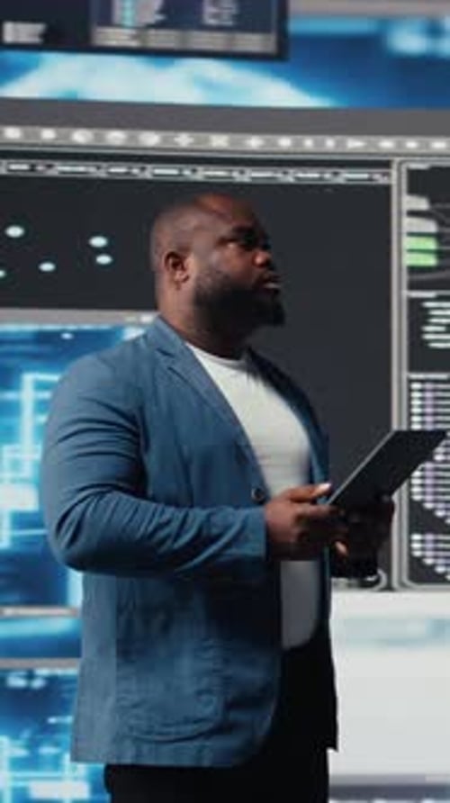 Vertical Video African American Developer Working on Programming and Automation