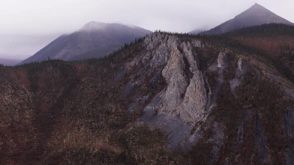 Sharp Cliff On Sapper Hill During Autumn In Yukon, Canada. aerial shot ...
