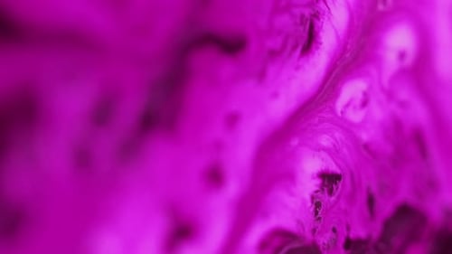 Abstract Purple Ink Swirls Slowly