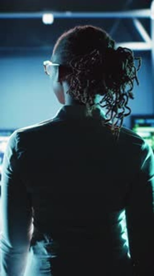 Software Engineer in Data Control Center at Night