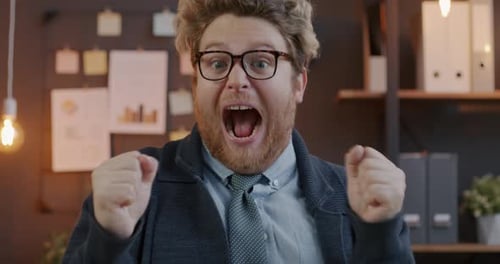Loop Portrait of Excited Businessman Screaming and Waving Hands Expressing Joy and Happiness Looking