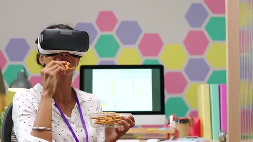 Metaverse, vr and woman eating in creative startup agency connecting to cyber experience