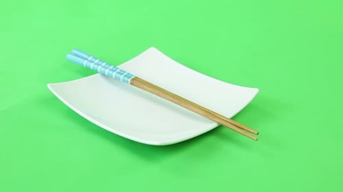 plate chopsticks turning on green screen