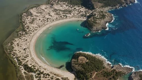 Scenic Lagoon of Voidokilia in Greece at Daytime - aerial drone shot