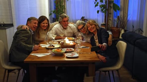 Friends Taking Selfie at Dinner Party Celebration