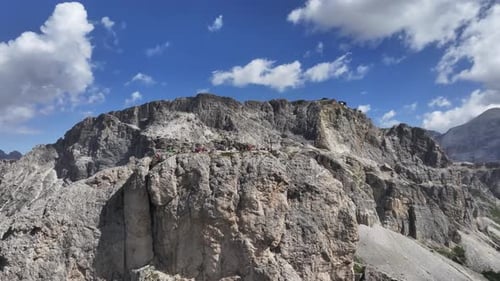 drone landscape of dolomites with some clouds