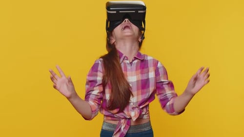 Girl Enjoys Immersive Experience with Virtual Reality Headset