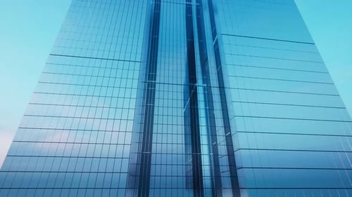 Modern Glass Skyscraper Exterior With Sunshine And Reflection On The Windows