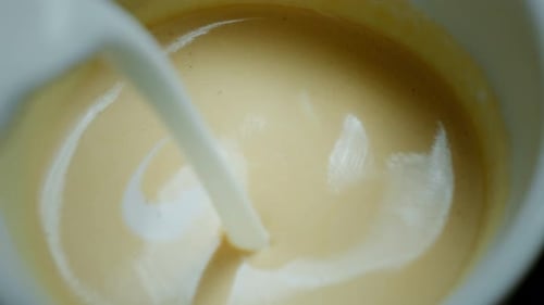 Barista Make Coffee Latte Art with Coffee Espresso Machine in Coffee Shop