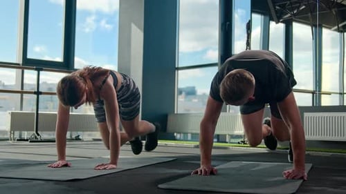 Active Caucasian Athletes Couple Man Woman Workout Mountain Climber Exercise Running Plank on