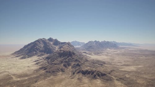 An Aerial View of a Mountain Range in the Desert