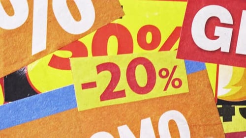 Pan Across Promo And Discount Numbers On Retail Flyers