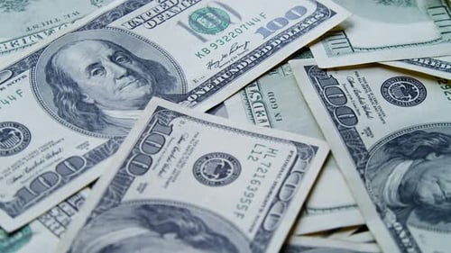 Close Up of Piles of One Hundred Dollar Bills