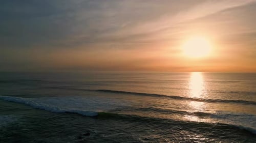Sunrise Sea Rippling Water Beach Aerial View Dawn Sky Over Dark Serene Ocean