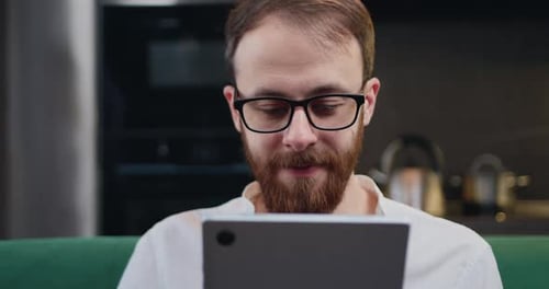 Man Using Tablet Indoors Close Up Shot
