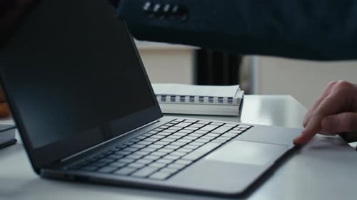 Male Hands Waking Laptop from Sleep Mode and Starting Work