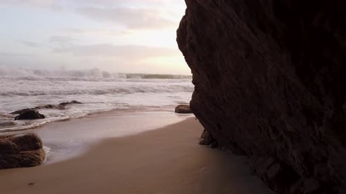 Ocean sunset on a rock beach in South Africa