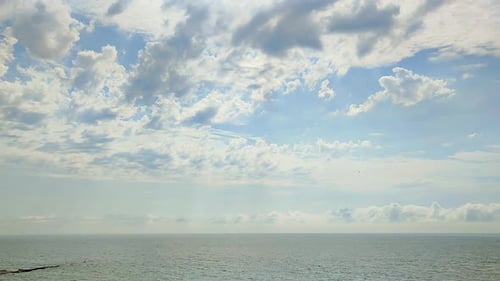 Fast Moving Rain and Cumulus Clouds Sky Over Sea Sunny Day Season Rainy Cloudy