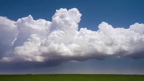 Building Storm Clouds Bubble Into The Atmosphere On Summer Day