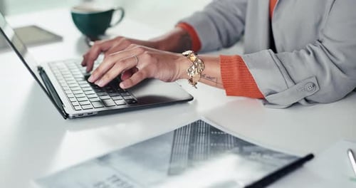 Business woman, typing and hands with laptop for info search, report and digital proposal in office