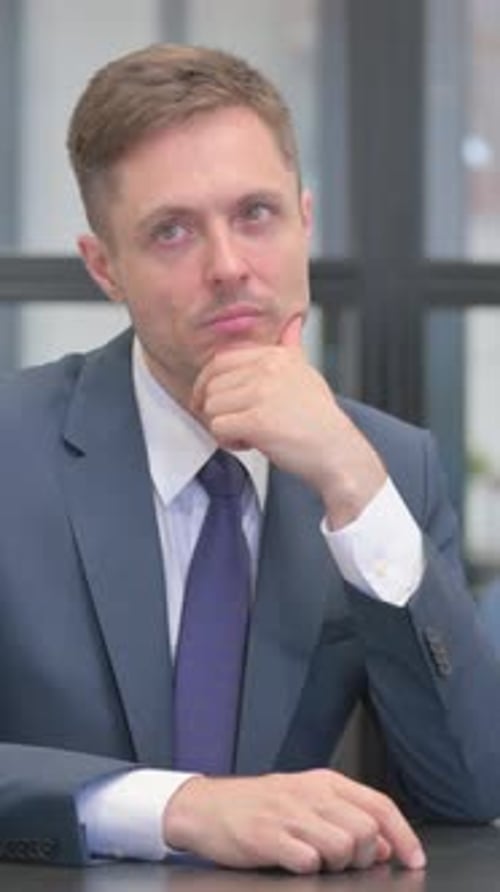 Vertical video, Brainstorming Mature Adult Businessman Thinking New Plan