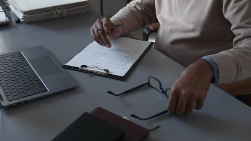 Man Working at Desk in Home Office