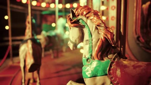 The Amusement Park Lies Silent Under the Night Sky Illuminated By Soft Lights