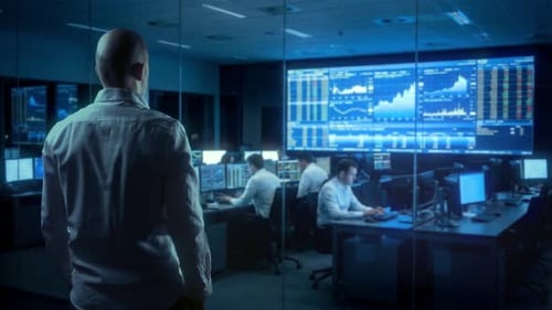 Market Supervisor Assesses Daily Performance Metrics And Trends Within Busy Trading Floor Atmosphere