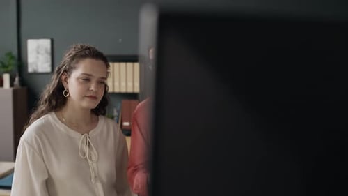 Employees Looking at Screen