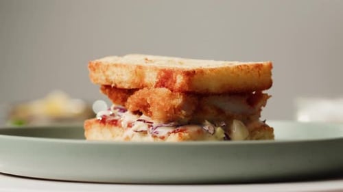 American Deep Fried Fish or Chicken Sandwich with Ham Meet Cuts in Restaurant Cooking Famous Thick