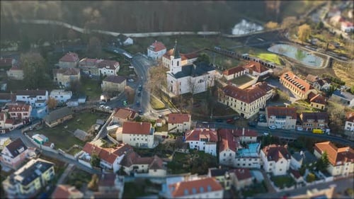 Aerial view of the St. Fabian and Sebastian church and its' neighborhood in Prague. Toylike houses w