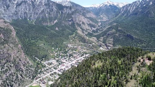 Aerial view of mountains and valley with town, United States.