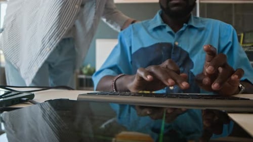 Unrecognizable Men Coworking On Code