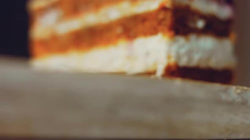 Delectable Slice of Multi-Layered Cake with Fruit