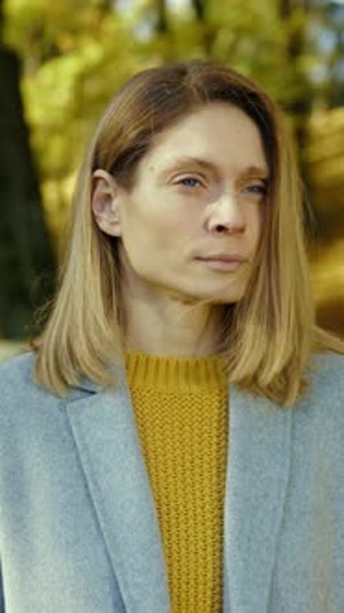 Blond Young Woman Having Headache Feel Cold Sneezes Stand in Park Autumn at Sunlight Lady Pain Tired