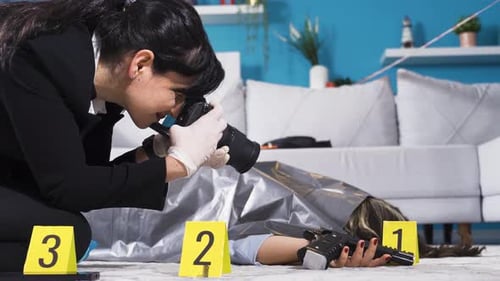 Woman Photographs Crime Scene with Body and Gun