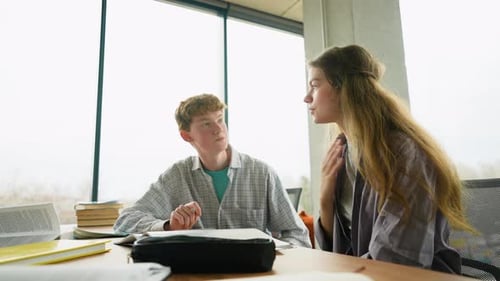 Students Studying Together in Modern Classroom