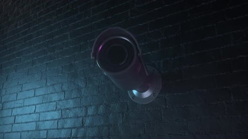 Security Camera Activating with Red Light Reveal on Brick Wall