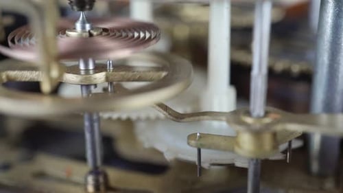 Clock Gears Turning in Intricate Mechanism
