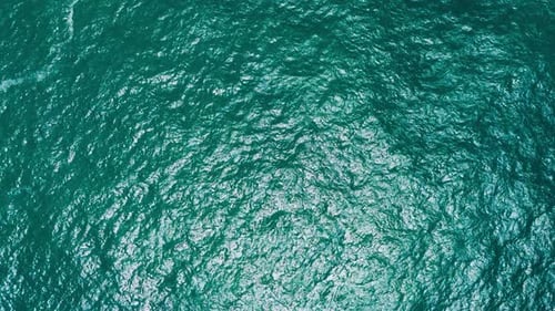 Aerial view from top of beautiful blue sea water